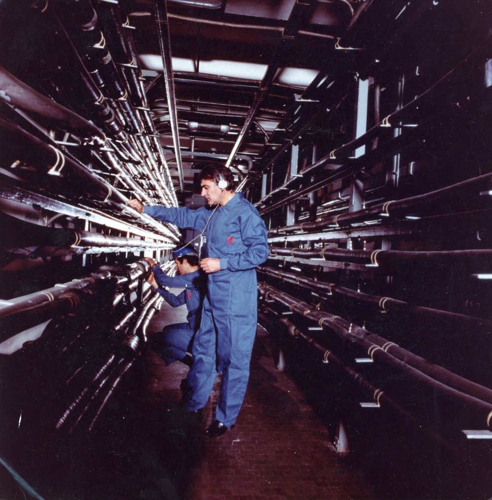 PHOTO REPORT : GUARDS CHECKING A TELEPHONE EXCHANGE RECORDING CAMERA