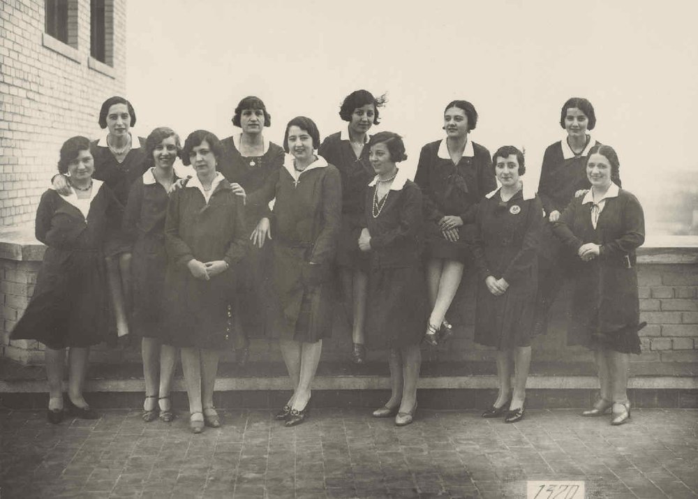 Group of ladies in traffic.