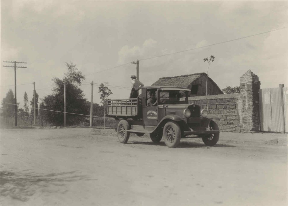 Laying of copper wires by truck on the line from Montevideo to Colonia.