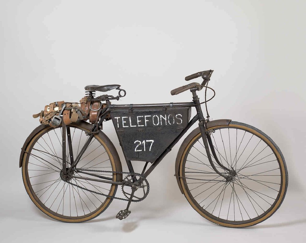 Iron bicycle, with a central bar, equipped with a carrier and a suitcase for transporting tools and accessories. This vehicle was used for transporting maintenance personnel. Specifically, this bicycle was used as a...