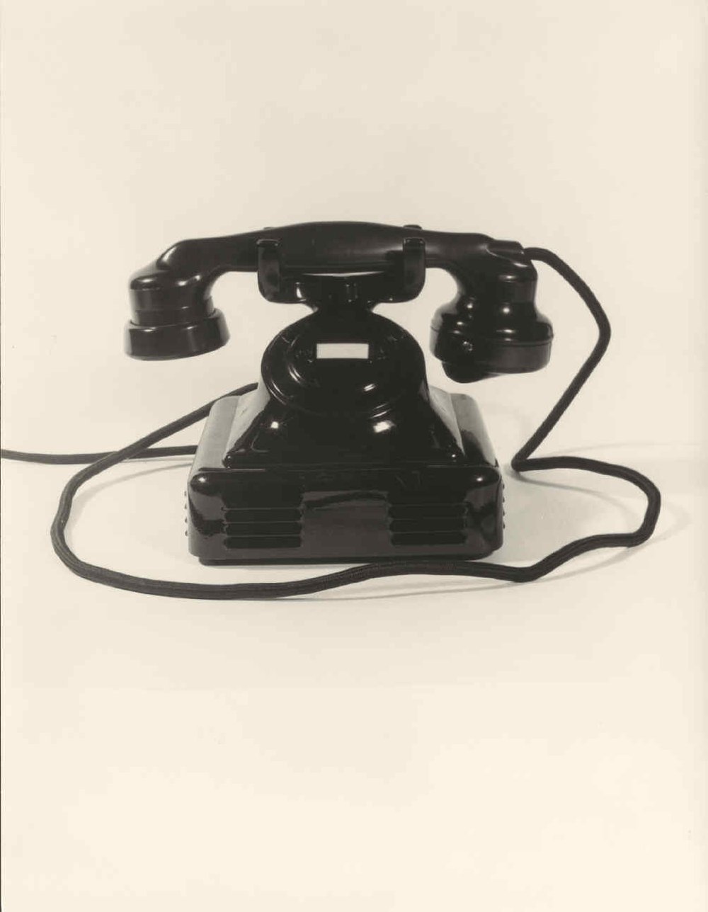 Black manual desktop telephone.