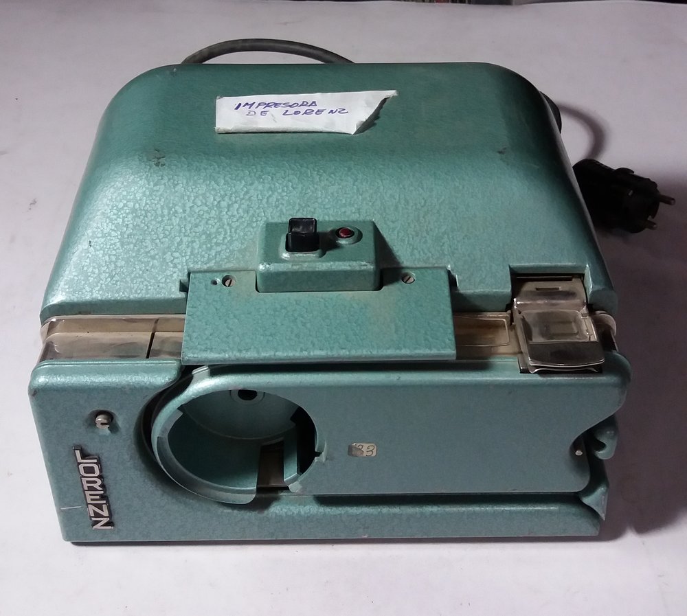 This is a punch tape transmitter. It is used for the transmission of teletype texts that have been previously punched on paper tape. It emits 400 characters per minute.