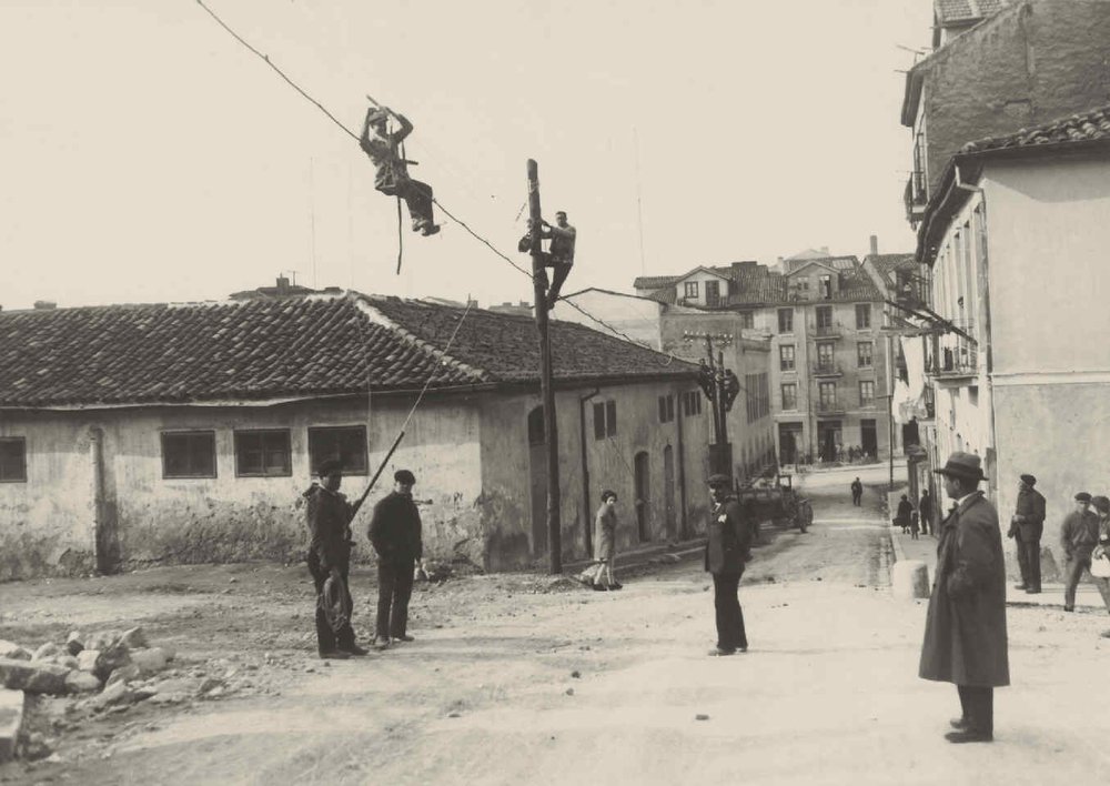 Santander. Laying of aerial cable.