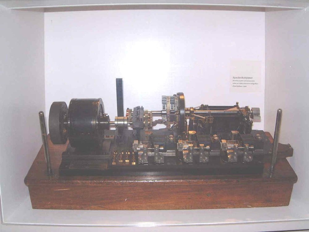 Telegraph synchronising regenerator. This apparatus carried up to four telegraphic communications simultaneously. To achieve this, it used a motor which rotated at high speed a disc on which the four channels were connected to each other at the same time, and which was used as a...