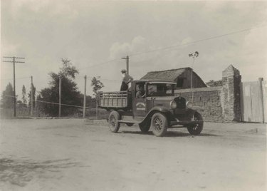 Laying of copper wires by truck on the line from Montevideo to Colonia.